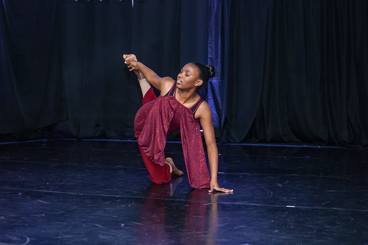Theatre performance dancing African student